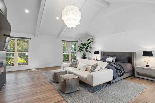 bedroom with high vaulted ceiling, hardwood / wood-style floors, a notable chandelier, and beam ceiling