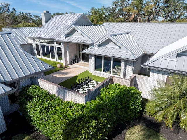 back of house featuring a patio area