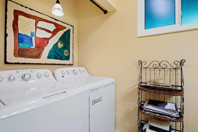 washroom featuring washer and dryer