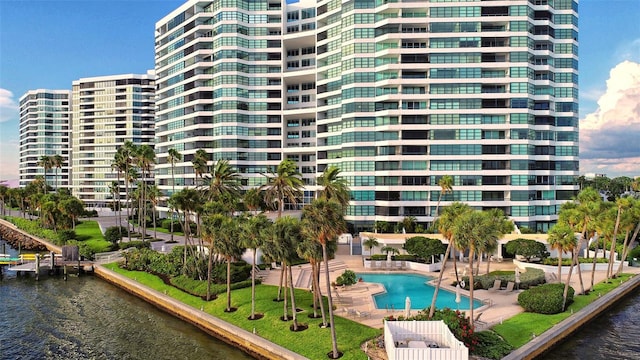 view of building exterior with a water view