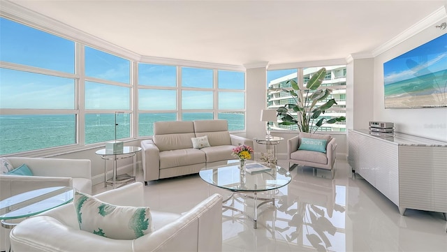 sunroom / solarium with a water view