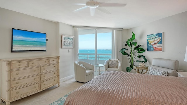 bedroom with access to outside, baseboards, a ceiling fan, and light colored carpet