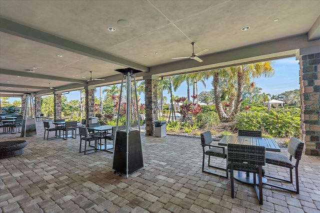 view of patio / terrace featuring ceiling fan