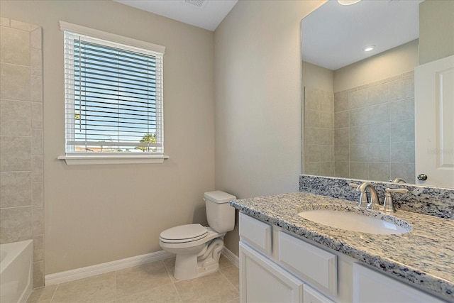 bathroom with tile patterned flooring, vanity, and toilet