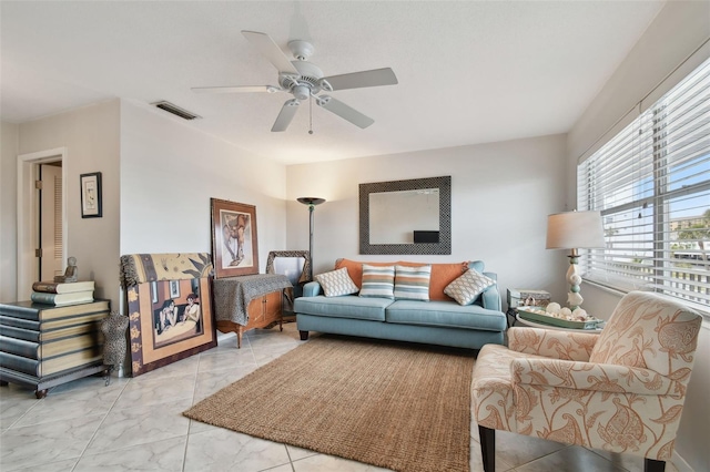 living room featuring ceiling fan