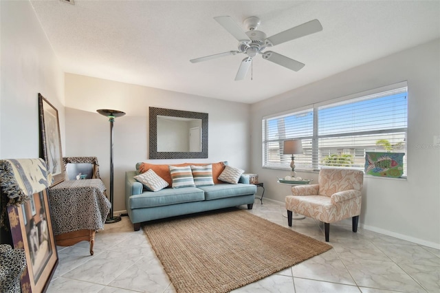 living room with ceiling fan