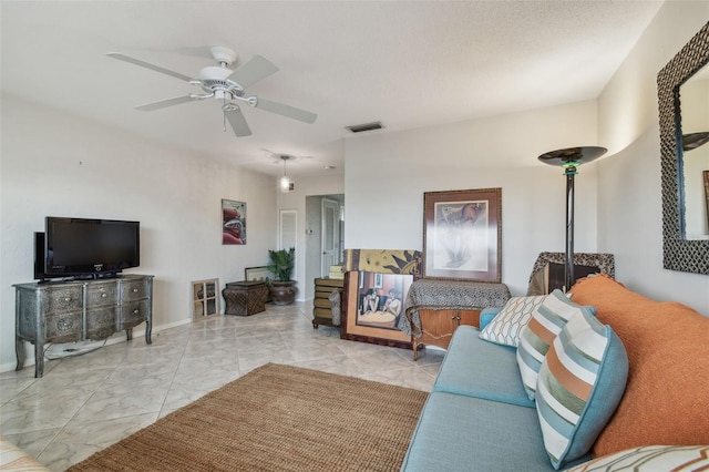 living room with ceiling fan