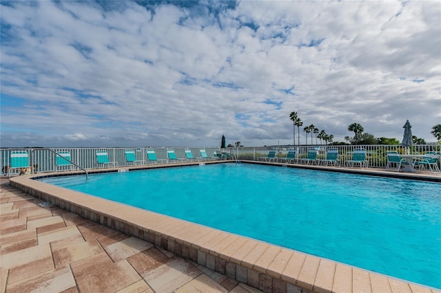 view of pool featuring a patio area