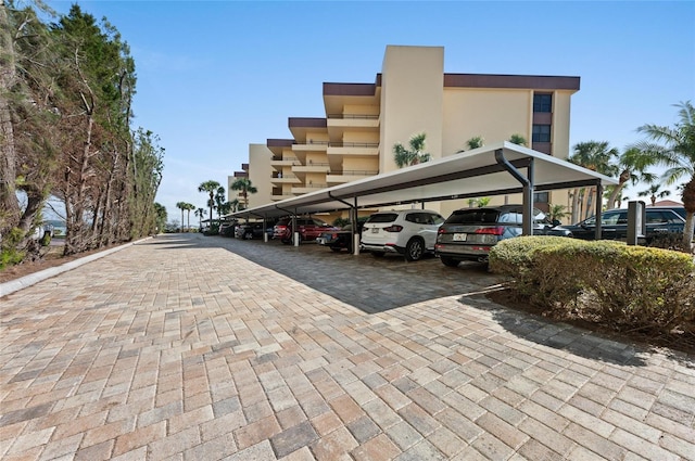 view of parking with a carport