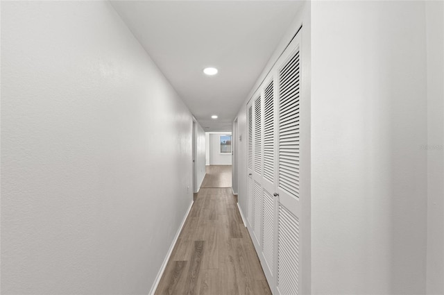 hall featuring light hardwood / wood-style flooring