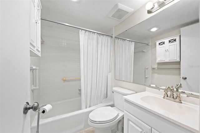 full bathroom featuring shower / bathtub combination with curtain, vanity, and toilet