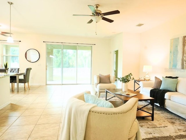 5718 Broad River Run, Ellenton, FL 34222 - living room with light tile patterned flooring and a ceiling fan