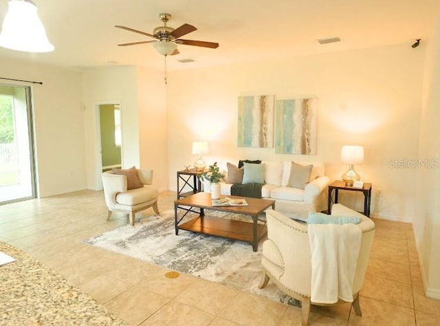 5718 Broad River Run, Ellenton, FL 34222 - tiled living room with a ceiling fan and baseboards