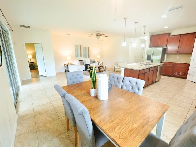 5718 Broad River Run, Ellenton, FL 34222 - dining space with light tile patterned floors, ceiling fan, and recessed lighting