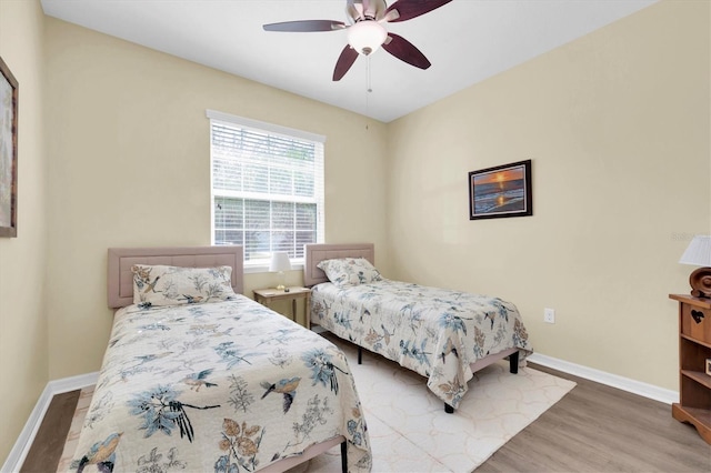 5718 Broad River Run, Ellenton, FL 34222 - bedroom featuring wood finished floors and ceiling fan
