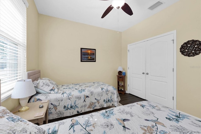 5718 Broad River Run, Ellenton, FL 34222 - bedroom with dark wood-type flooring, a ceiling fan, and a closet