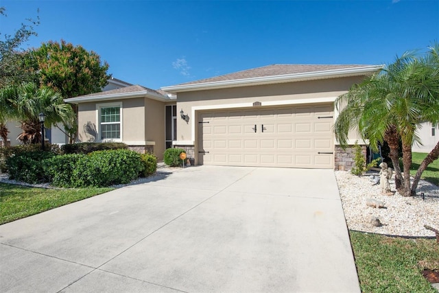 5718 Broad River Run, Ellenton, FL 34222 - single story home featuring stone siding, stucco siding, an attached garage, and driveway