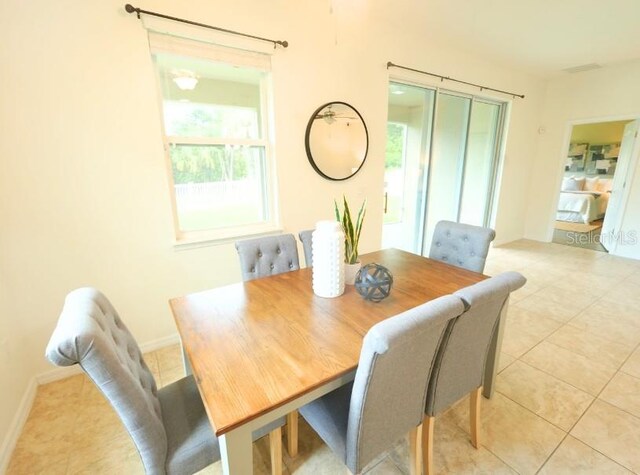 5718 Broad River Run, Ellenton, FL 34222 - dining room featuring plenty of natural light and light tile patterned floors
