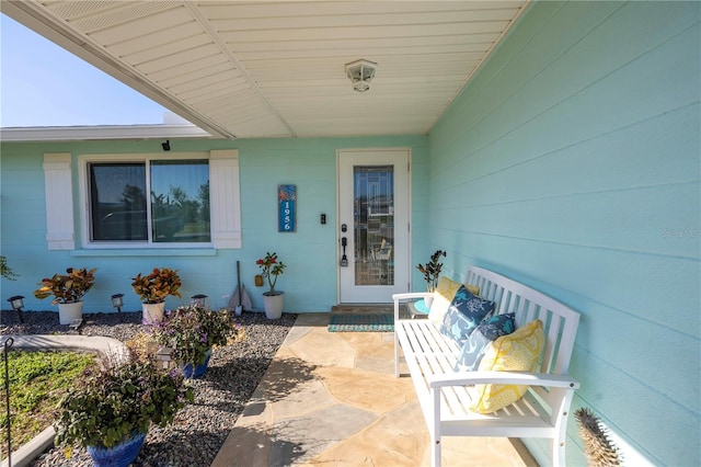 property entrance with a patio