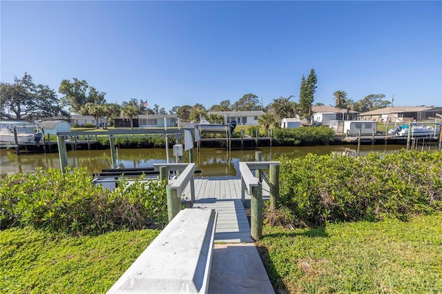 dock area with a water view