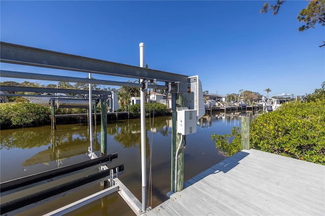 dock area with a water view