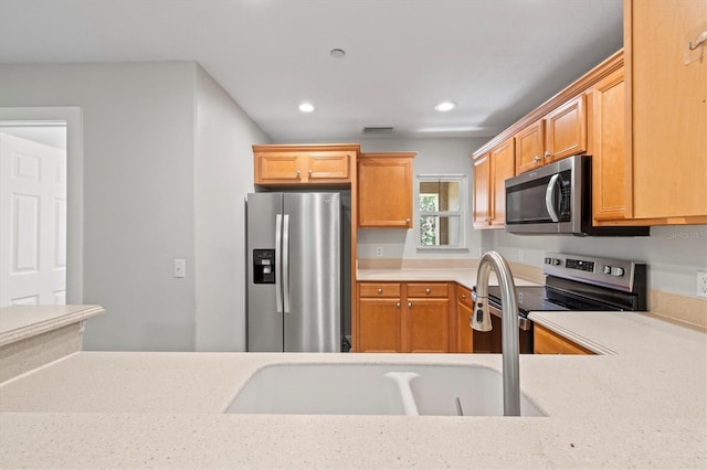 kitchen with stainless steel appliances and sink