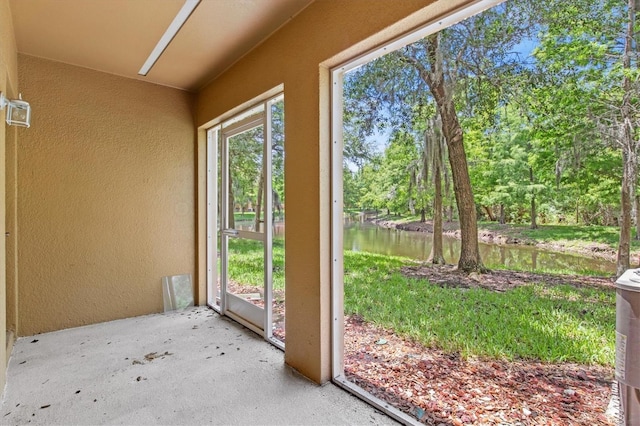 doorway featuring a water view