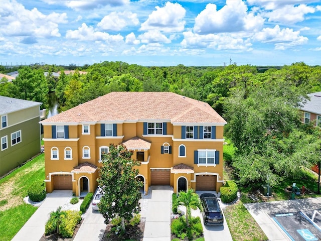 view of front of property featuring a garage