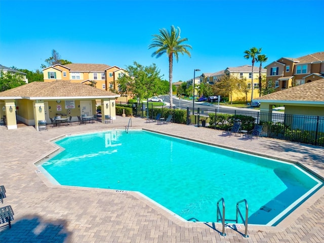 view of swimming pool featuring a patio