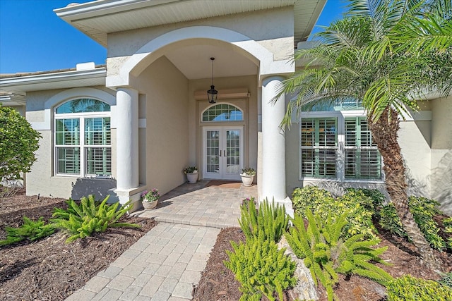 doorway to property featuring french doors