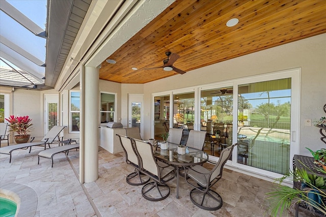 view of patio with ceiling fan