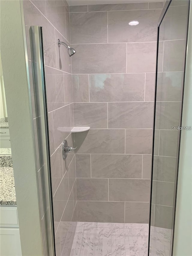 bathroom featuring walk in shower