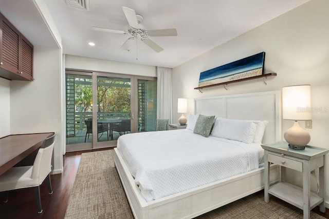 bedroom featuring dark hardwood / wood-style flooring, access to exterior, and ceiling fan