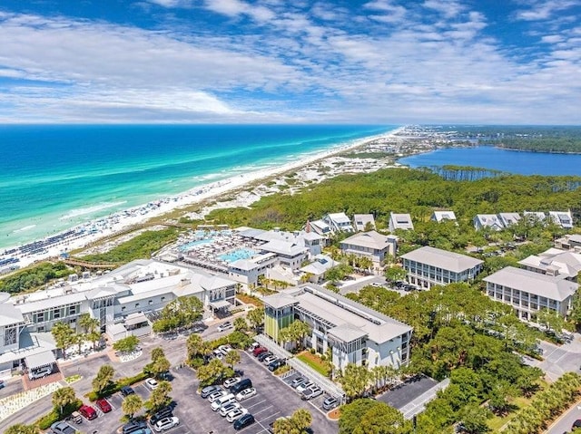 aerial view with a view of the beach and a water view