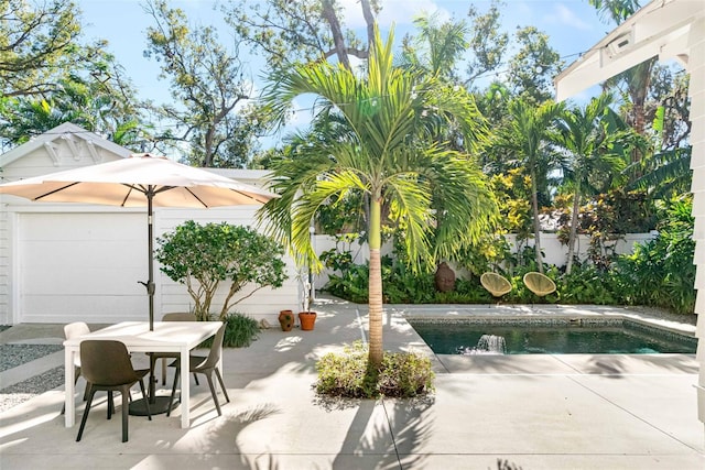 view of pool featuring a patio area