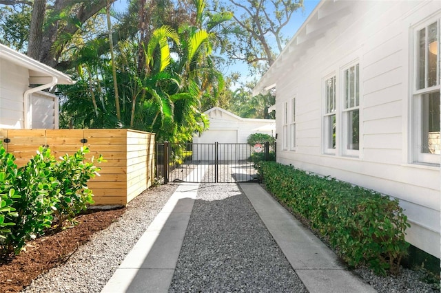 view of yard with an outbuilding and a garage