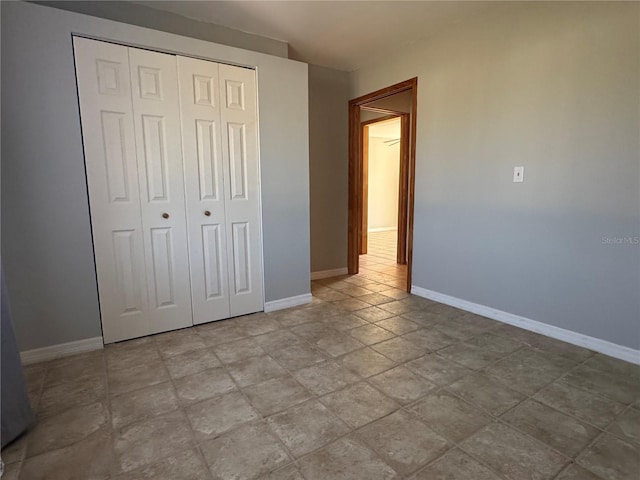 unfurnished bedroom featuring a closet