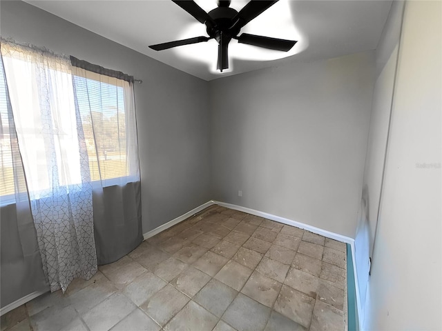 empty room featuring ceiling fan