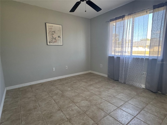 unfurnished room featuring ceiling fan