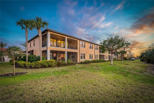 view of outdoor building at dusk