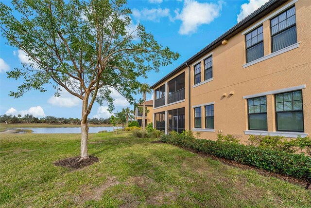 view of yard with a water view