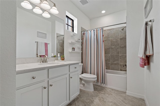 full bathroom featuring shower / tub combo, vanity, tile patterned floors, and toilet