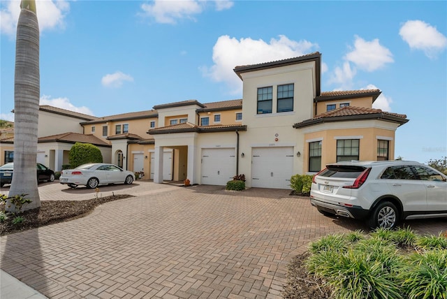 view of front of property with a garage