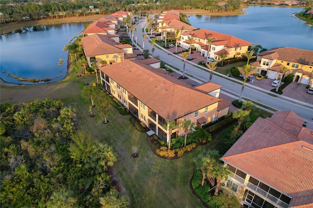 bird's eye view with a water view