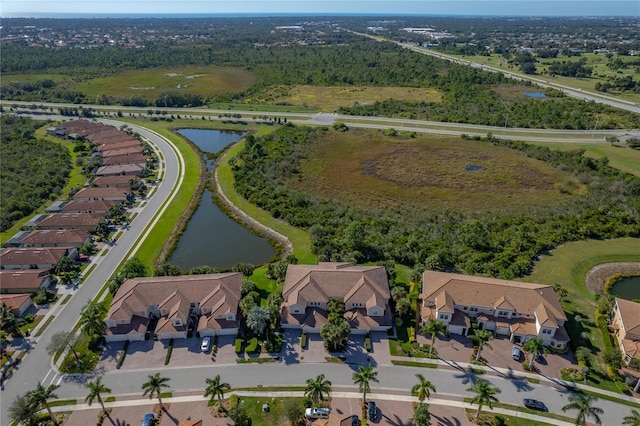 drone / aerial view with a water view