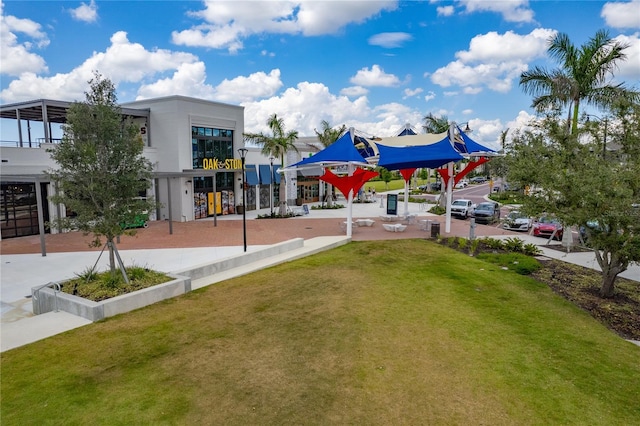 view of home's community with a lawn