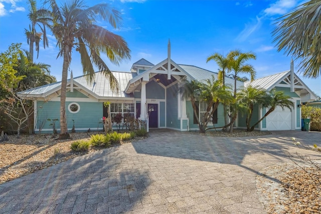 view of front of property with a garage