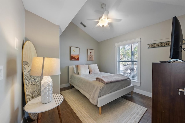 bedroom with lofted ceiling, hardwood / wood-style floors, and ceiling fan