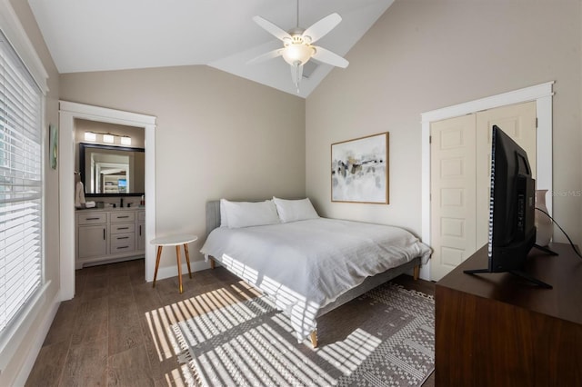 bedroom featuring lofted ceiling, dark wood-type flooring, and ceiling fan