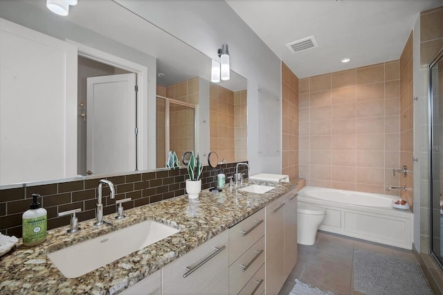 full bathroom with toilet, tasteful backsplash, separate shower and tub, vanity, and tile patterned flooring